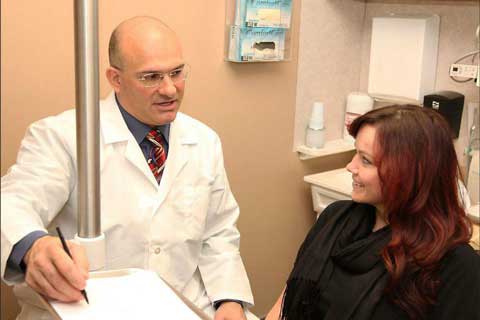 Dr Sal with a patient