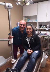 Dr Sal Storniolo with woman in exam room